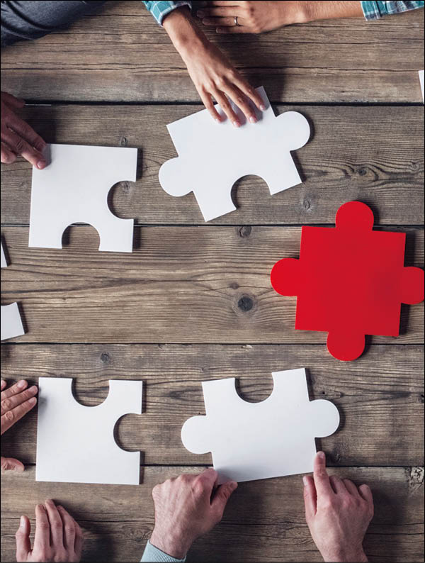 Hipster business successful teamwork concept  business group assembling jigsaw puzzle