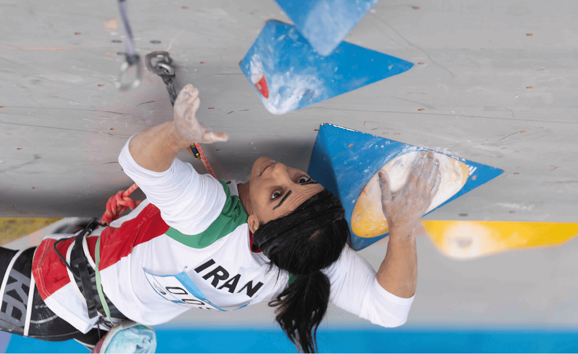 Iranian athlete Elnaz Rekabi competes during the women's Boulder